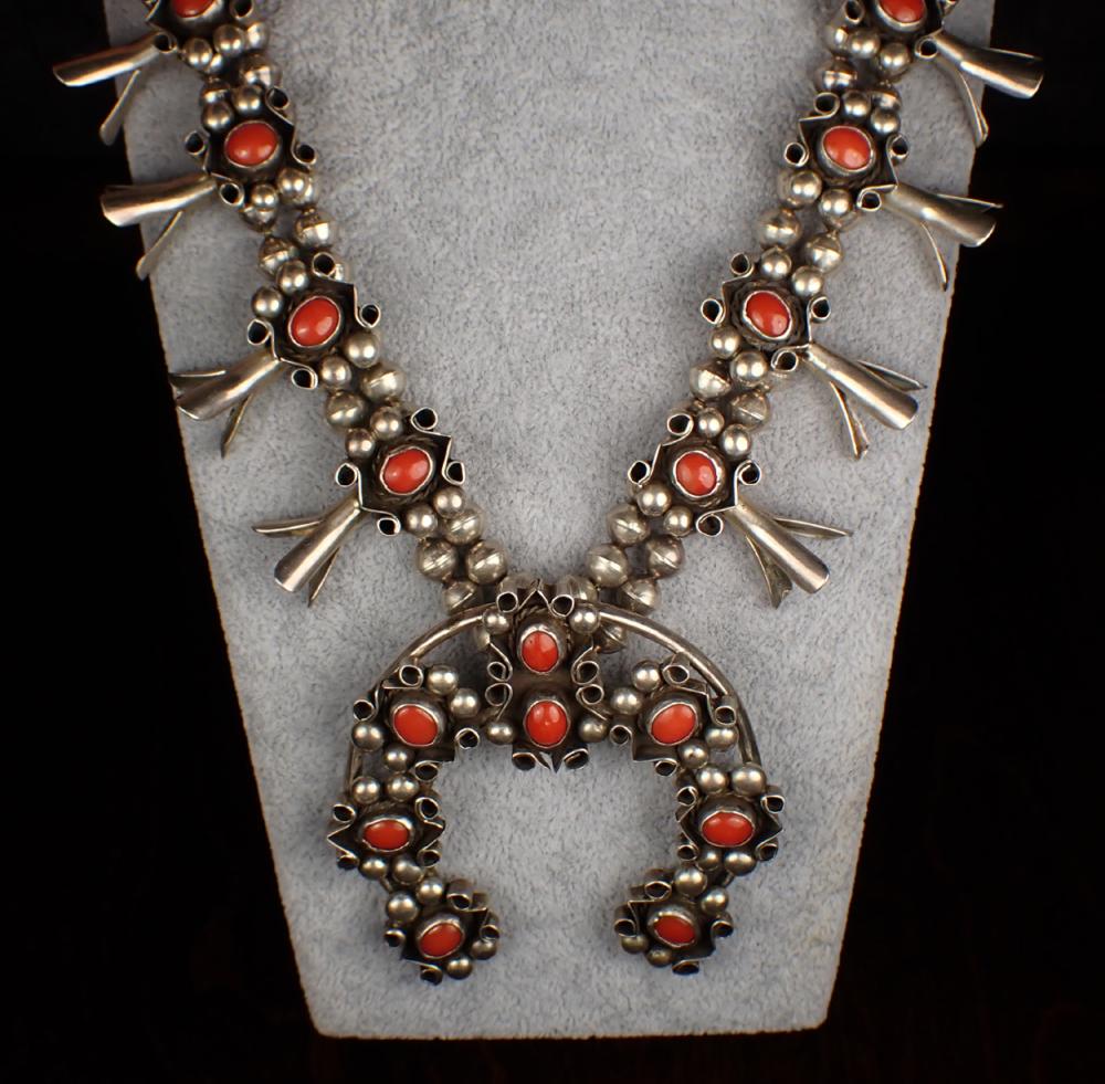 Appraisal: SILVER AND RED CORAL SQUASH BLOSSOM NECKLACE southwestern Navajo style