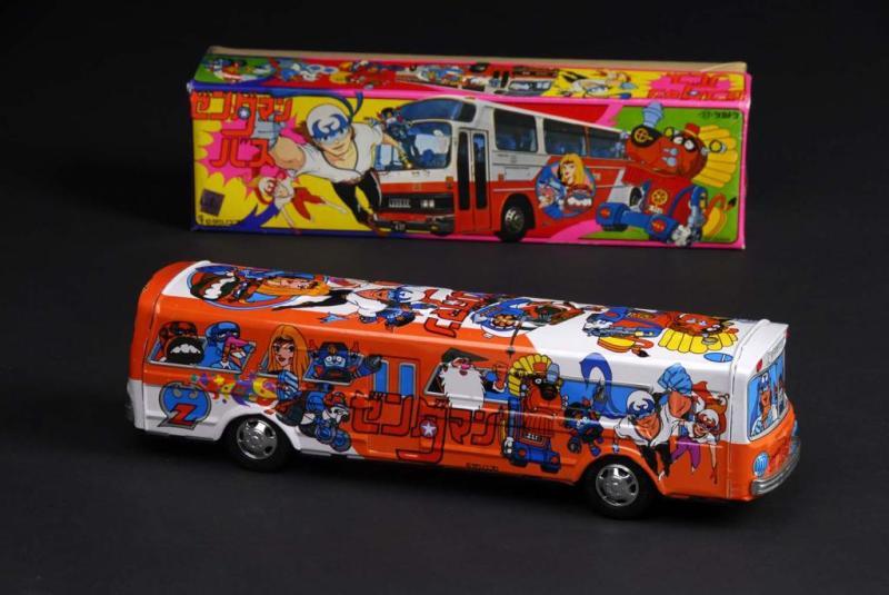 Appraisal: Superhero in Bus Toy Description Japanese Made by TT Working