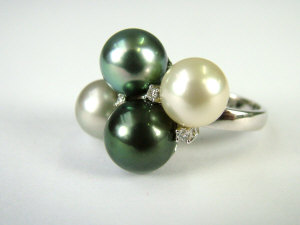 Appraisal: A Damiani pearl set ring With original presentation box