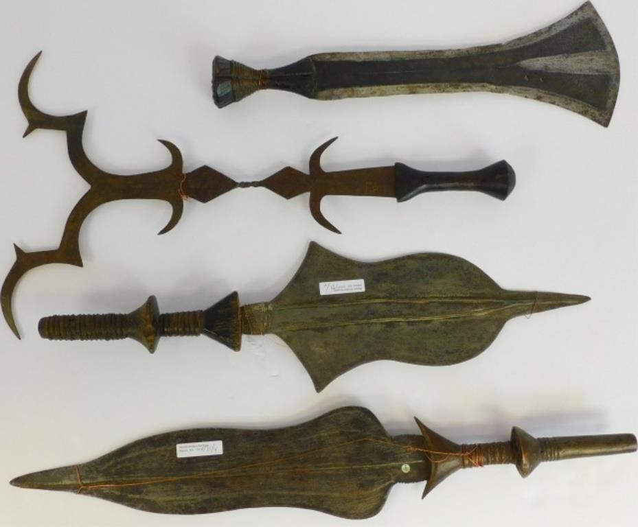 Appraisal: FOUR TH C AFRICAN WEAPONS TO INCLUDE METALthrowing knife with