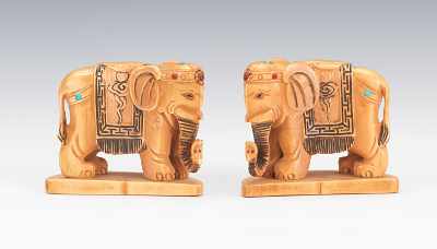 Appraisal: A Pair of Carved Ivory Elephant Figurines Carved as a