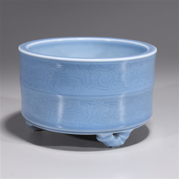 Appraisal: Chinese blue porcelain tripod censer with foliate designs and six-character