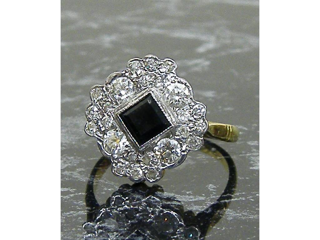 Appraisal: ct diamond and sapphire cluster ring the princess cut sapphire