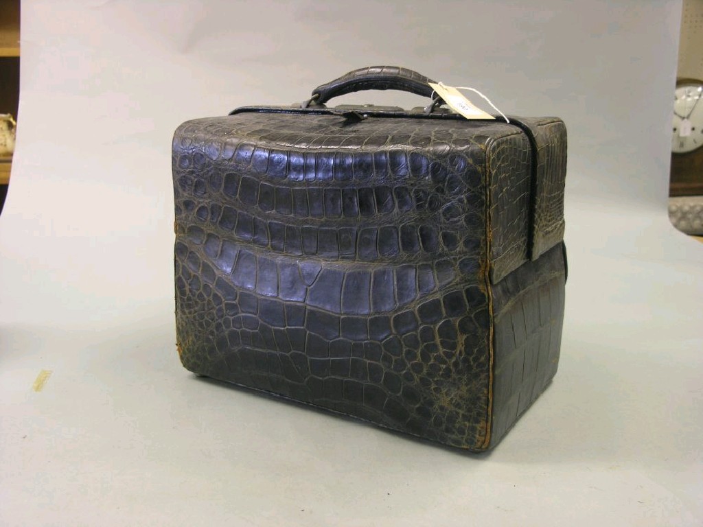 Appraisal: An early th century leather briefcase