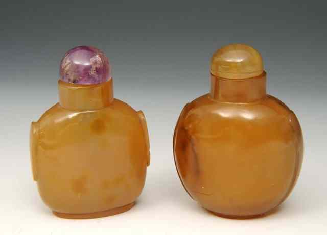 Appraisal: A CHINESE BROWN CHALCEDONY SNUFF BOTTLE of plain ovoid form