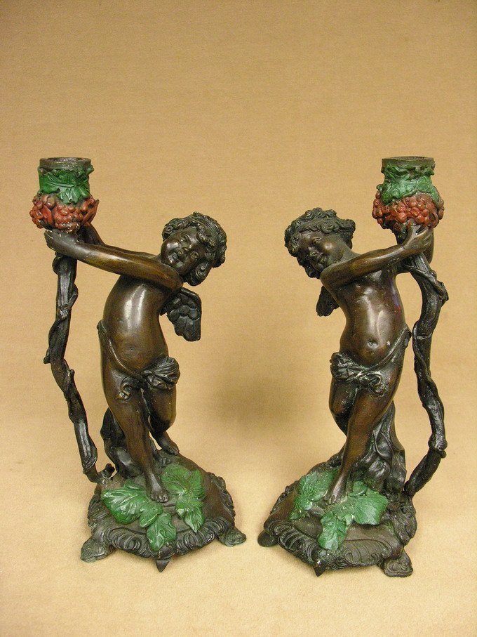 Appraisal: PAIR BRONZE CHERUB CANDLE HOLDERS Unsigned Age uncertain because no