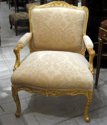 Appraisal: Louis XV style gilt painted fauteuil The toprail carved with