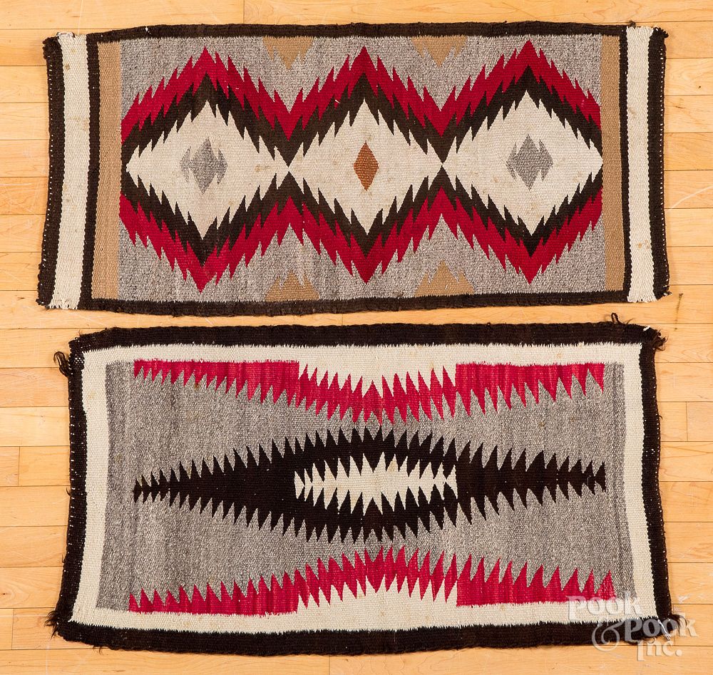 Appraisal: Two Navajo Indian rugs x and x Two Navajo Indian