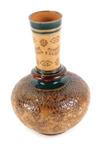 Appraisal: A Doulton Slater's stoneware vase decorated with flowers within green