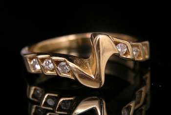 Appraisal: Ladies' Zigzag Diamond Ring A k yellow gold ring in