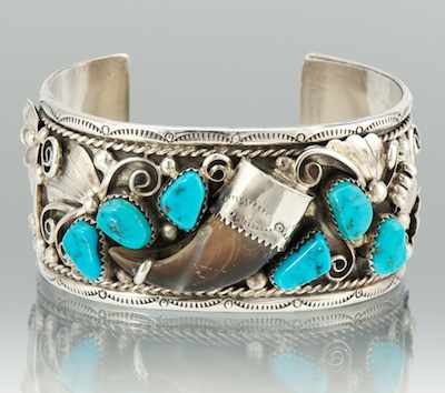 Appraisal: A Navajo Silver Turquoise and Bear Claw Bracelet Signed T