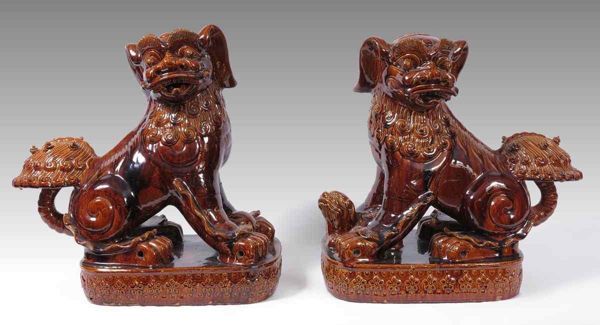 Appraisal: PAIR LARGE BROWN GLAZE CERAMIC GUARD FOO LIONS Age unknown