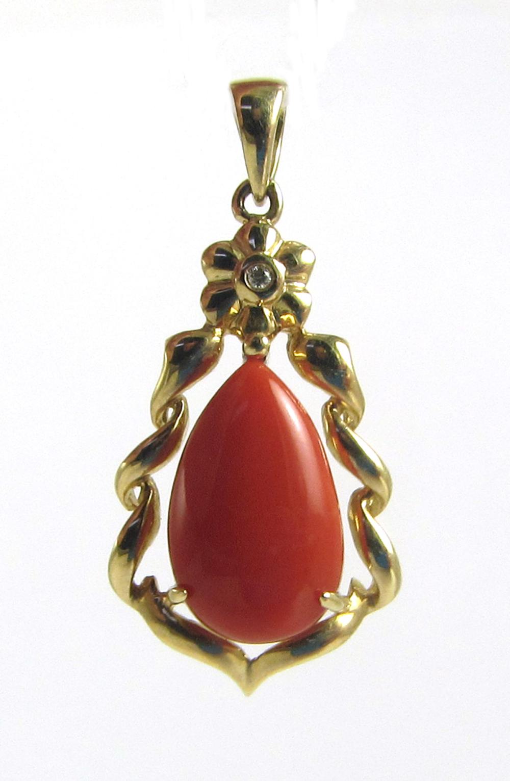 Appraisal: CORAL DIAMOND AND FOURTEEN KARAT GOLD PENDANT with a round-cut