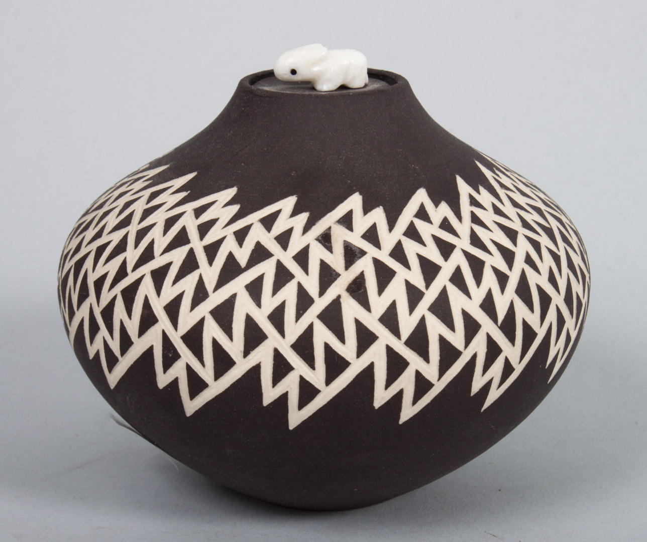 Appraisal: Pueblo pottery jar by Lucy Lewis black bodied jasper style