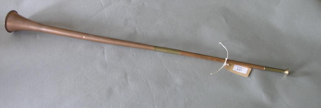 Appraisal: A reproduction copper hunting horn in