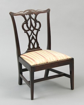 Appraisal: A Carved Walnut Child's Side Chair A charming carved Chippendale