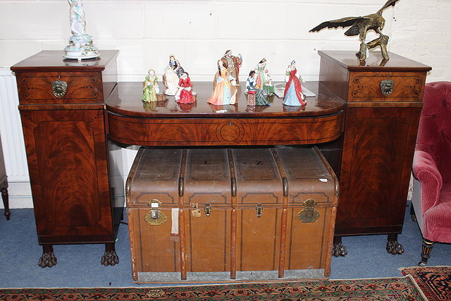 Appraisal: A GEORGE IV MAHOGANY PEDESTAL SIDEBOARD with shaped front cellarette