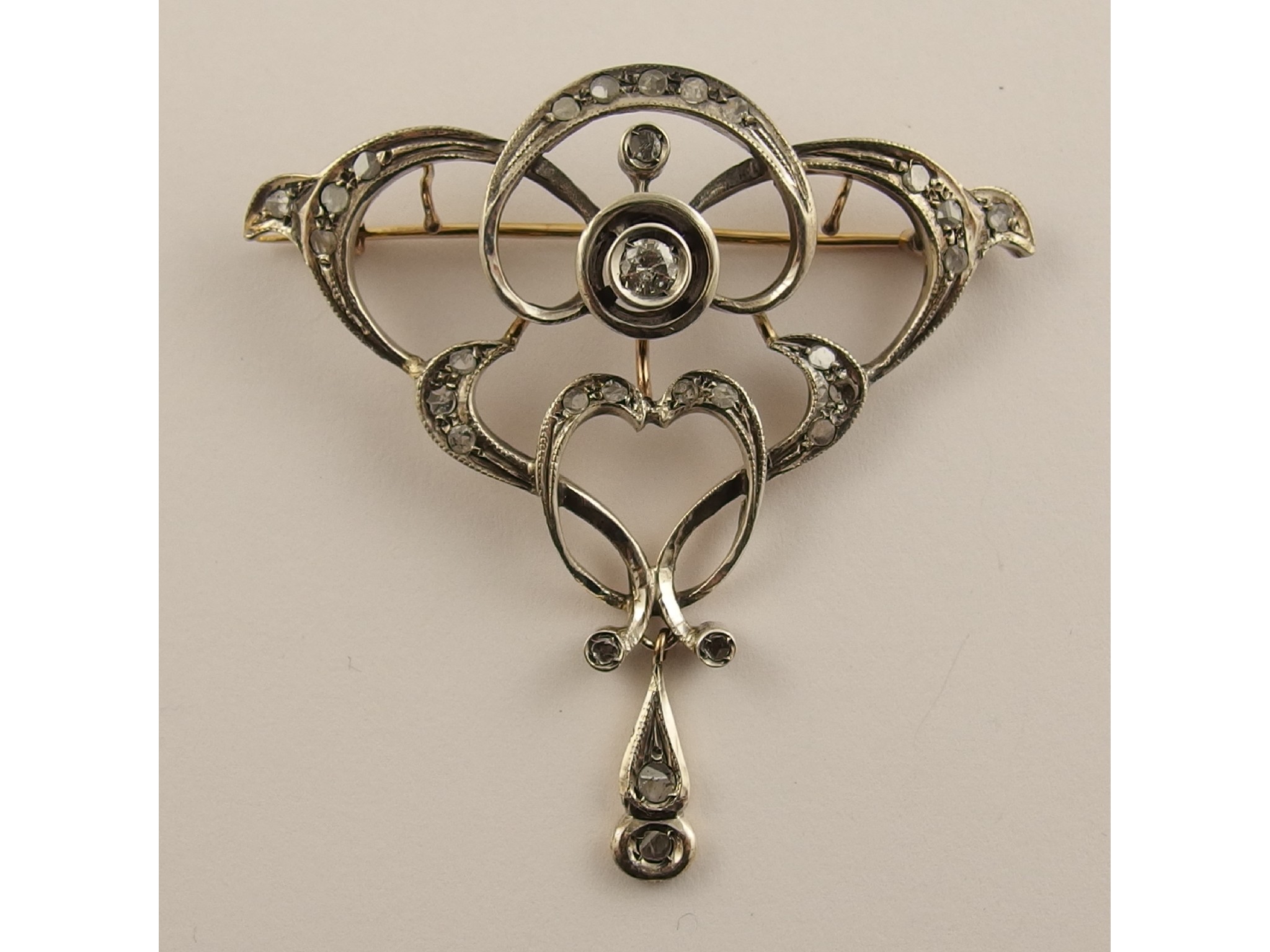 Appraisal: A diamond set Art Nouveau pendant broochthe interlaced design is