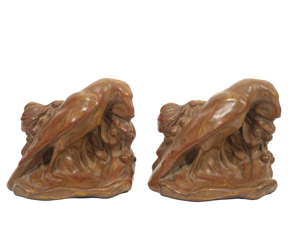 Appraisal: PR ROOKWOOD RAVEN ART POTTERY BOOKENDS Pair of art pottery