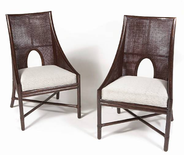 Appraisal: A pair of Thomas Pheasant upholstered back armchair McGuire Furniture