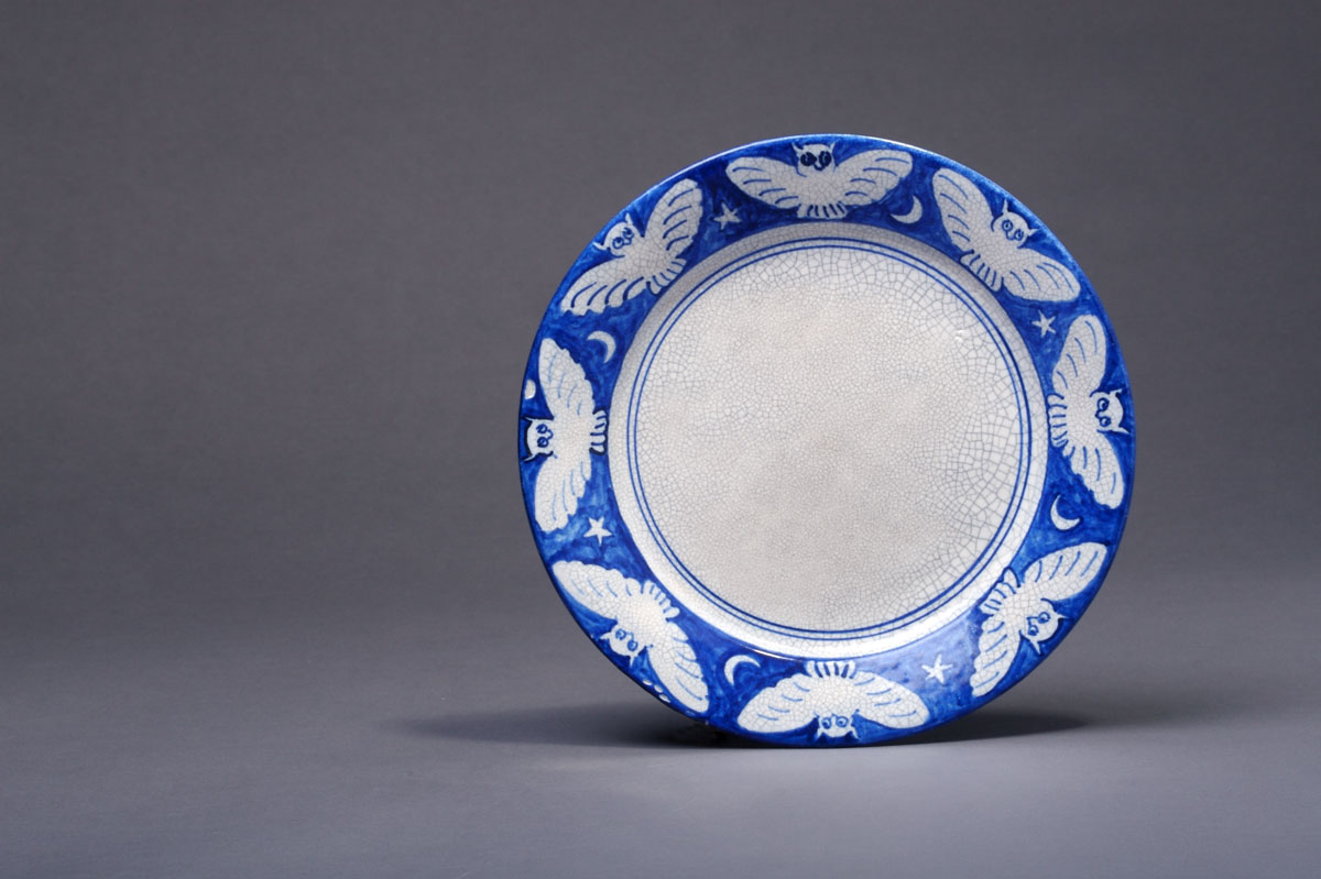 Appraisal: DEDHAM POTTERY 'OWL' PATTERN PLATE Painted in a bright blue