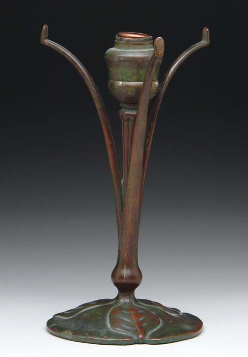 Appraisal: TIFFANY STUDIOS LAMP BASE Nicely three-pronged base has a decorated