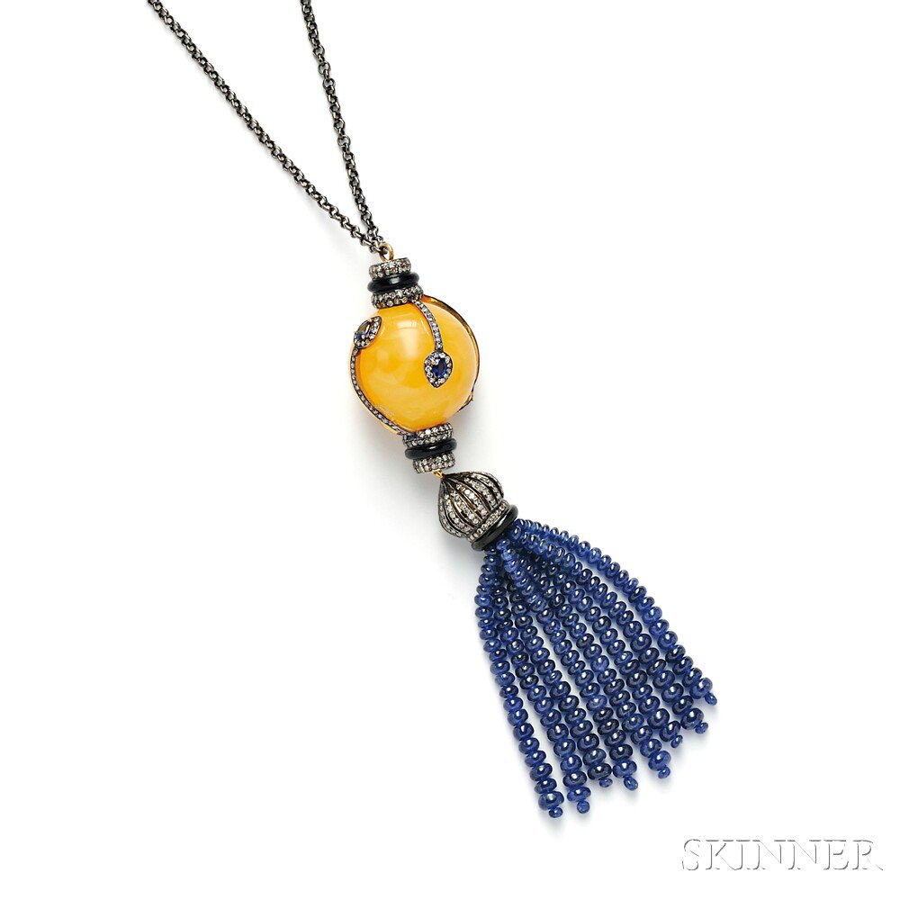 Appraisal: Amber Sapphire and Diamond Tassel the large amber bead wrapped