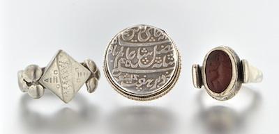 Appraisal: A Group of Three Interesting Rings Containing silver ring set