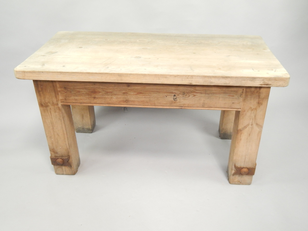 Appraisal: A heavy pine rectangular table on square section plain legs