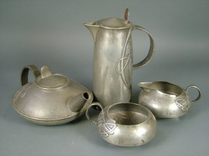 Appraisal: A Liberty Co 'Tudric' part tea service designed by Archibald