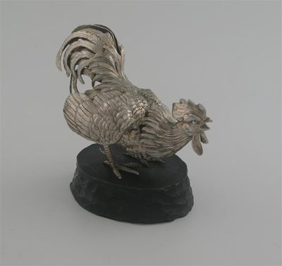 Appraisal: A continental cast model of a fighting cock on a