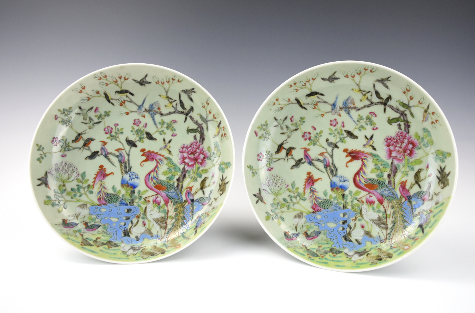 Appraisal: PAIR CHINESE CELADON FAMILLE ROSE PLATES TH C Pair of