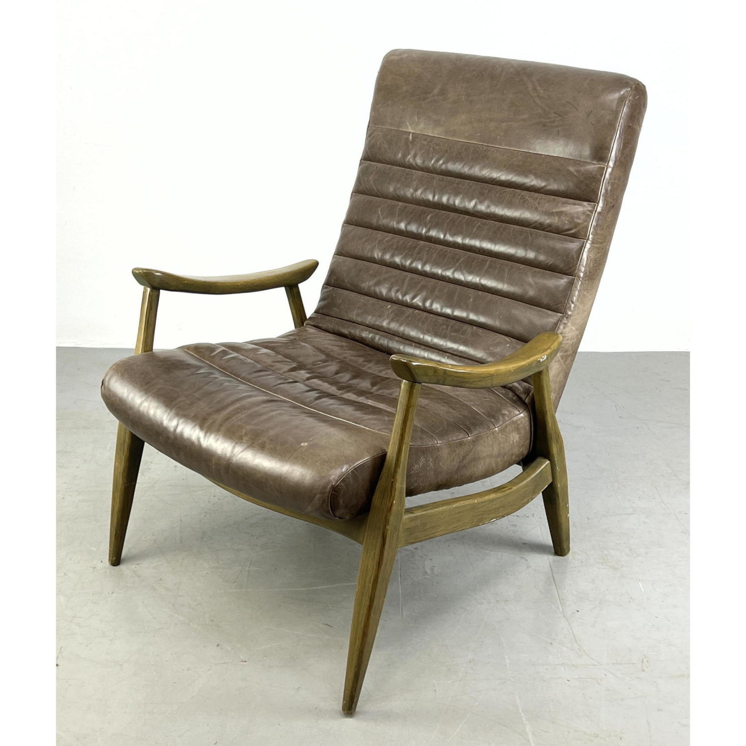 Appraisal: Leather Tall Back Lounge Chair Modernist Sloped Open Wood Arms