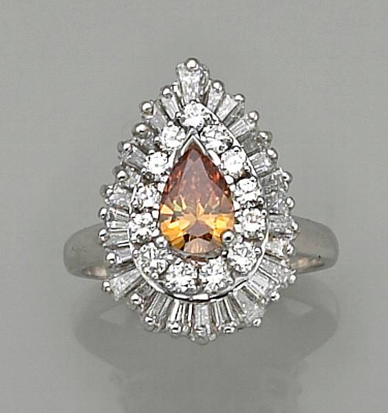 Appraisal: A colored diamond diamond and platinum ring-dant A Z Palais