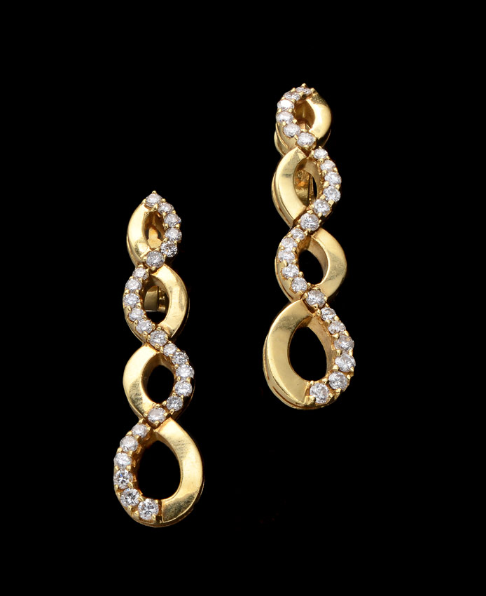 Appraisal: ELEGANT K DIAMOND EARRINGS K yellow gold earrings of round