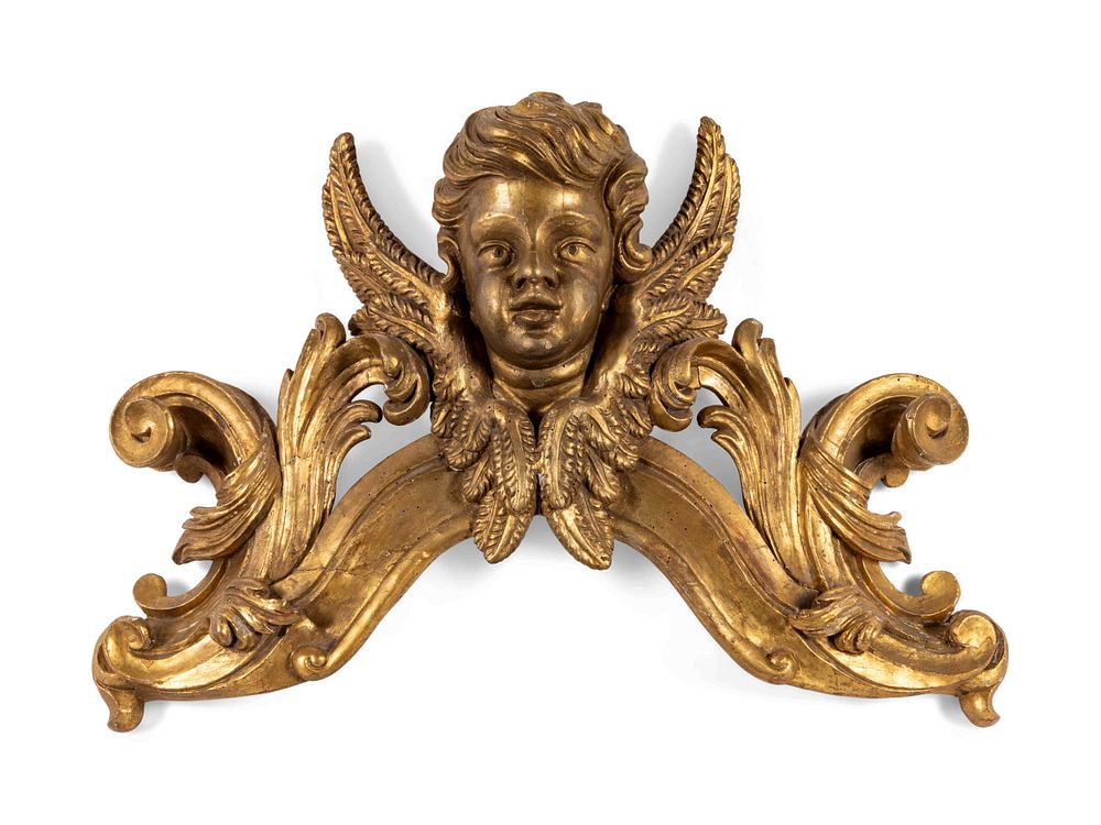 Appraisal: An Italian Carved Giltwood Ornament An Italian Carved Giltwood Ornament