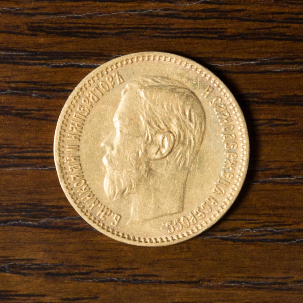 Appraisal: RUSSIAN EMPIRE FIVE ROUBLES GOLD COIN the obverse with side