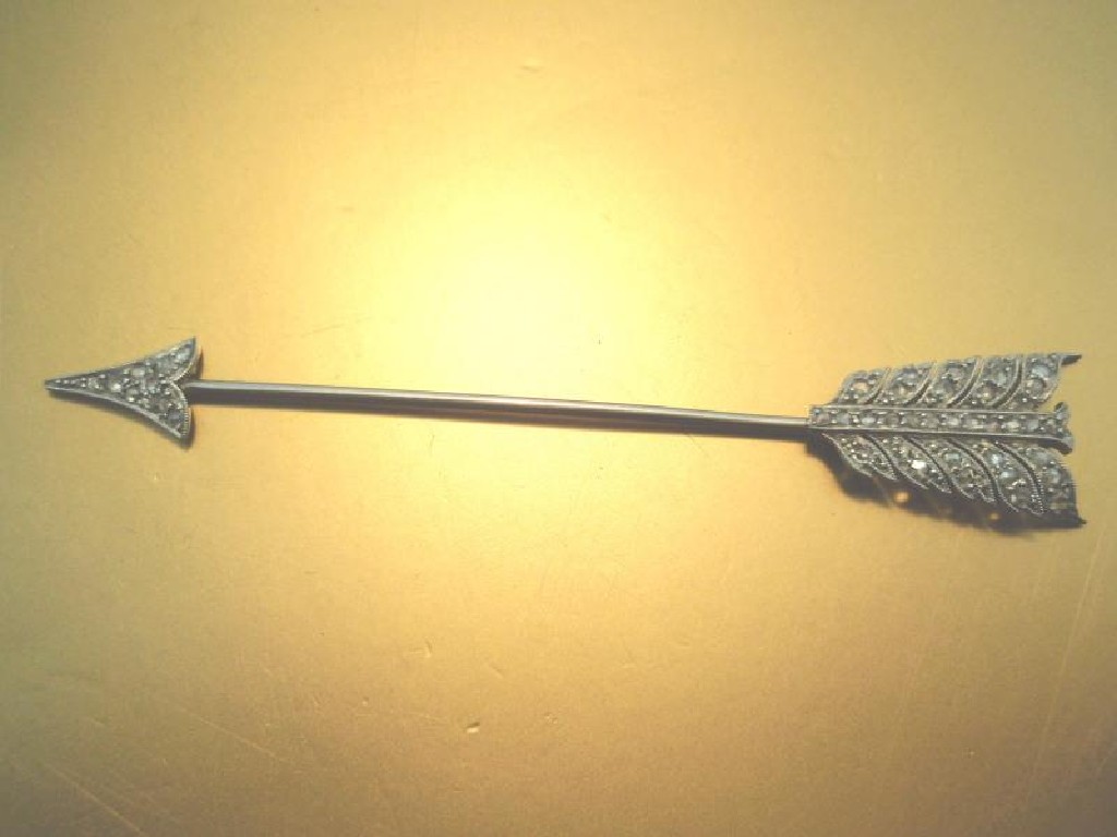 Appraisal: An arrow shaped stick pin with cut diamonds set in