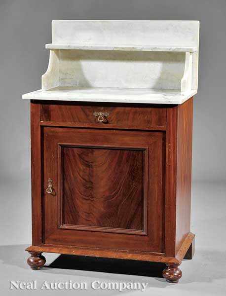 Appraisal: An American Classical Carved Mahogany Washstand mid- th c white