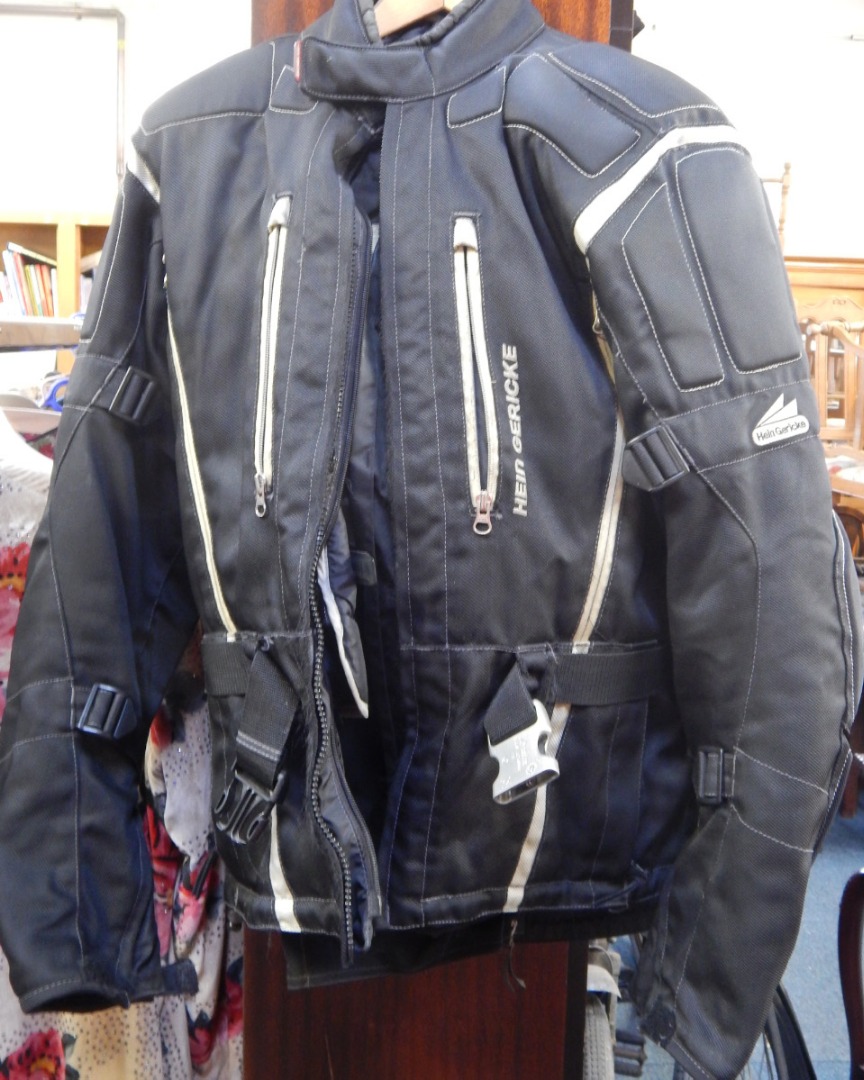 Appraisal: A Hein Gericke motorcycle jacket and matching trousers size medium