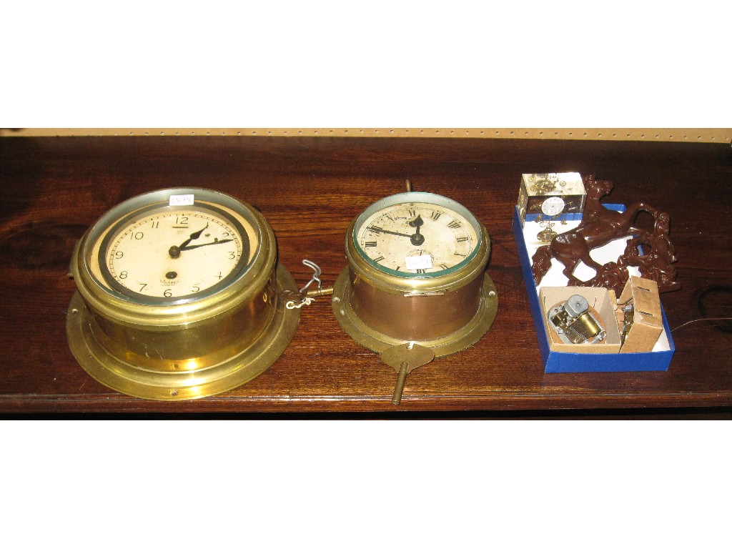 Appraisal: Lot comprising two ship's clocks and a box of clock