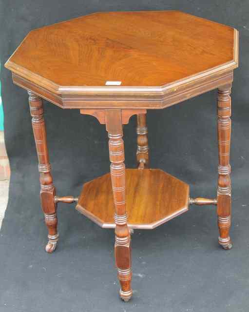 Appraisal: AN EDWARDIAN WALNUT OCTAGONAL OCCASIONAL TABLE with under gallery and