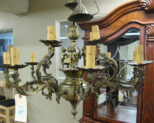 Appraisal: LOUIS XV STYLE SIXTEEN-LIGHT CHANDELIER with four cherub figures dancing