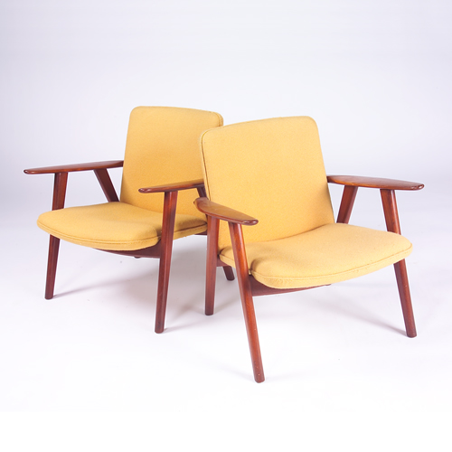 Appraisal: HANS WEGNER JOHANNES HANSEN Pair of teak armchairs with gold