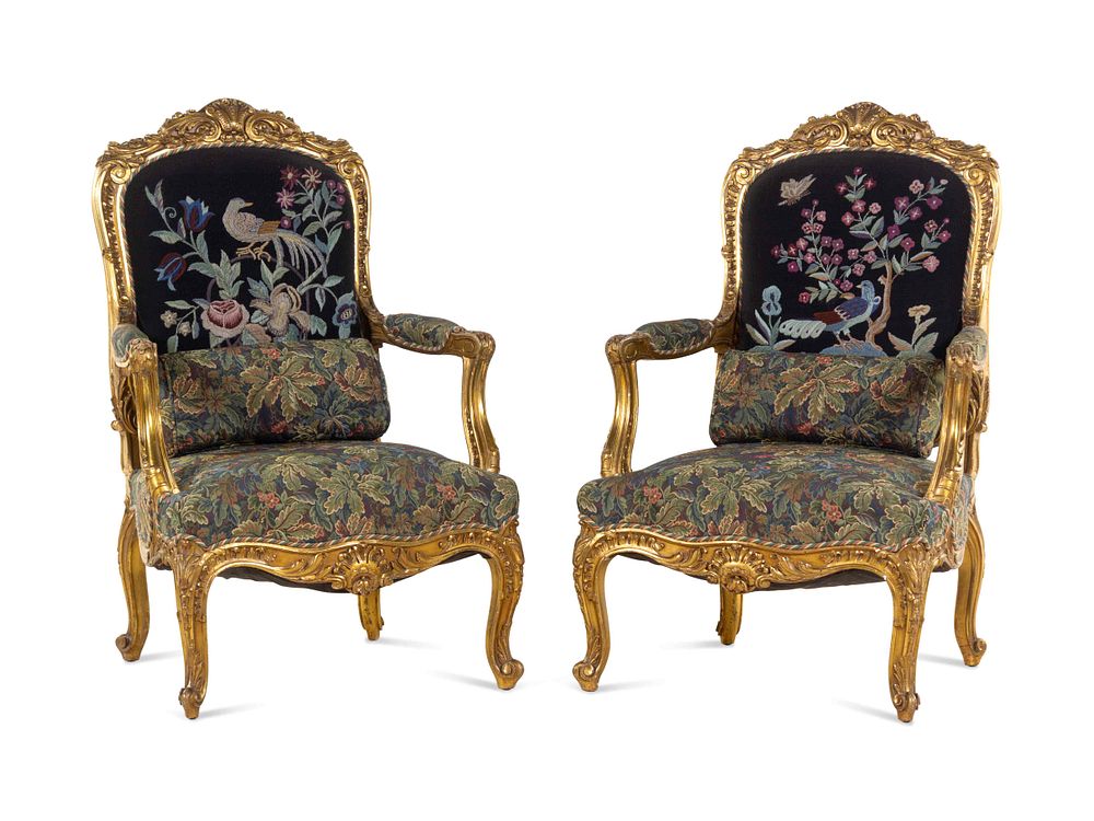 Appraisal: A Pair of Louis XV Style Carved Giltwood Fauteuils A