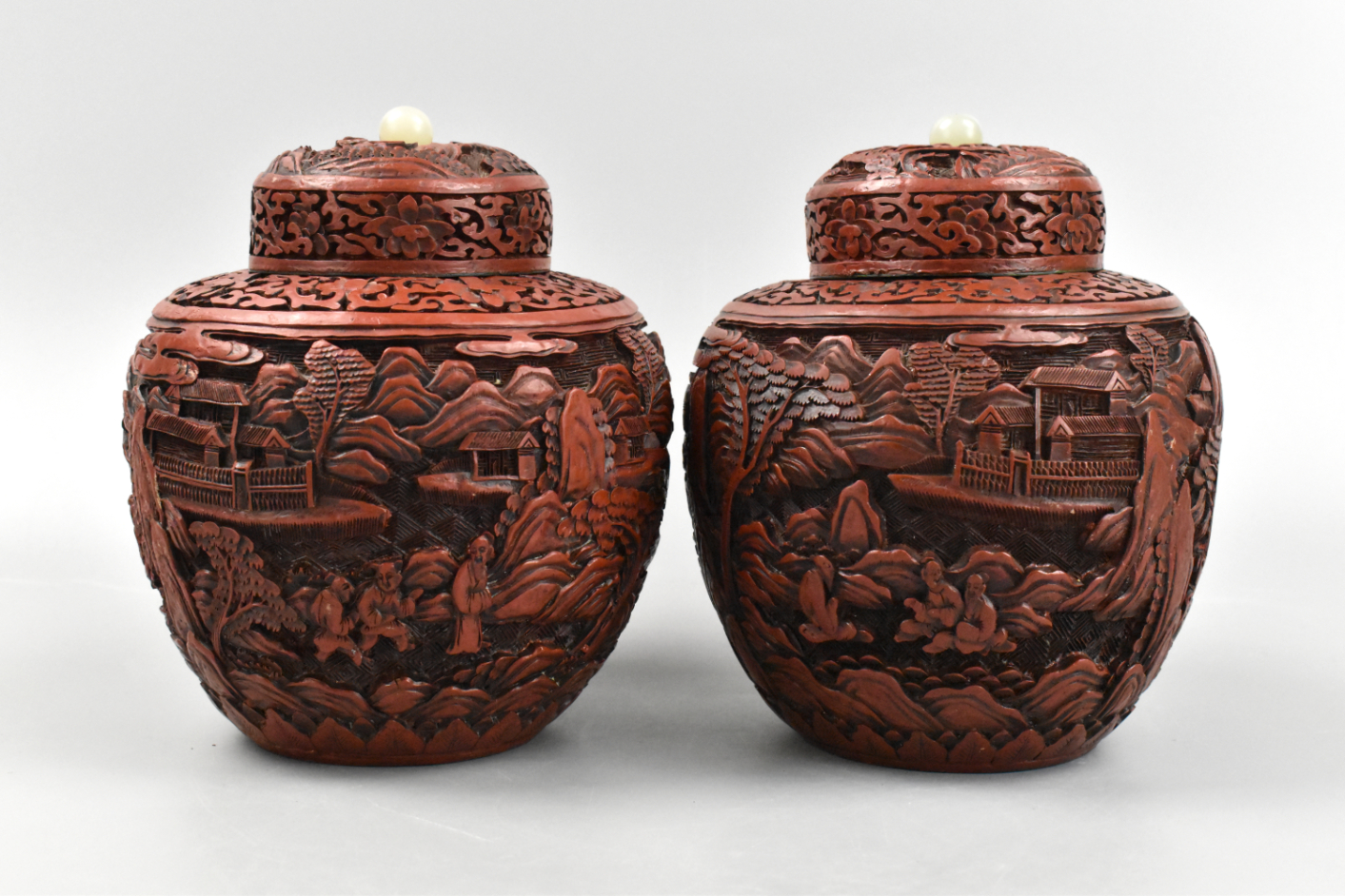 Appraisal: A pair of Chinese cinnabar covered jars dating from the