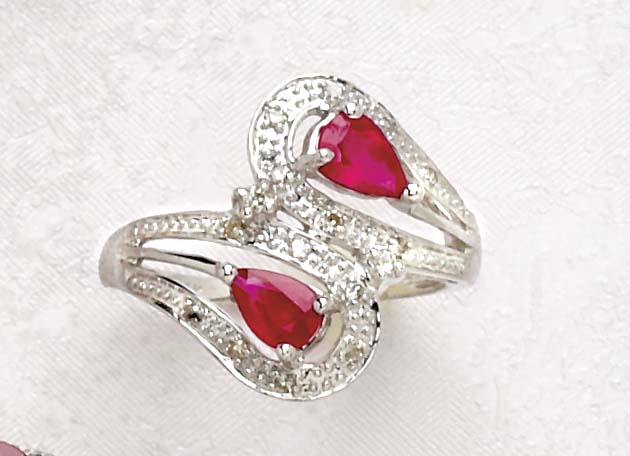 Appraisal: RUBY RING k white gold ring set with two pear