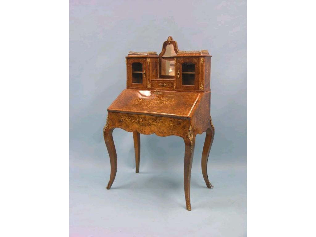 Appraisal: A mid-Victorian inlaid burr walnut writing desk with ormolu mounts