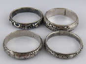 Appraisal: Four vintage Chinese silver bangles wt g