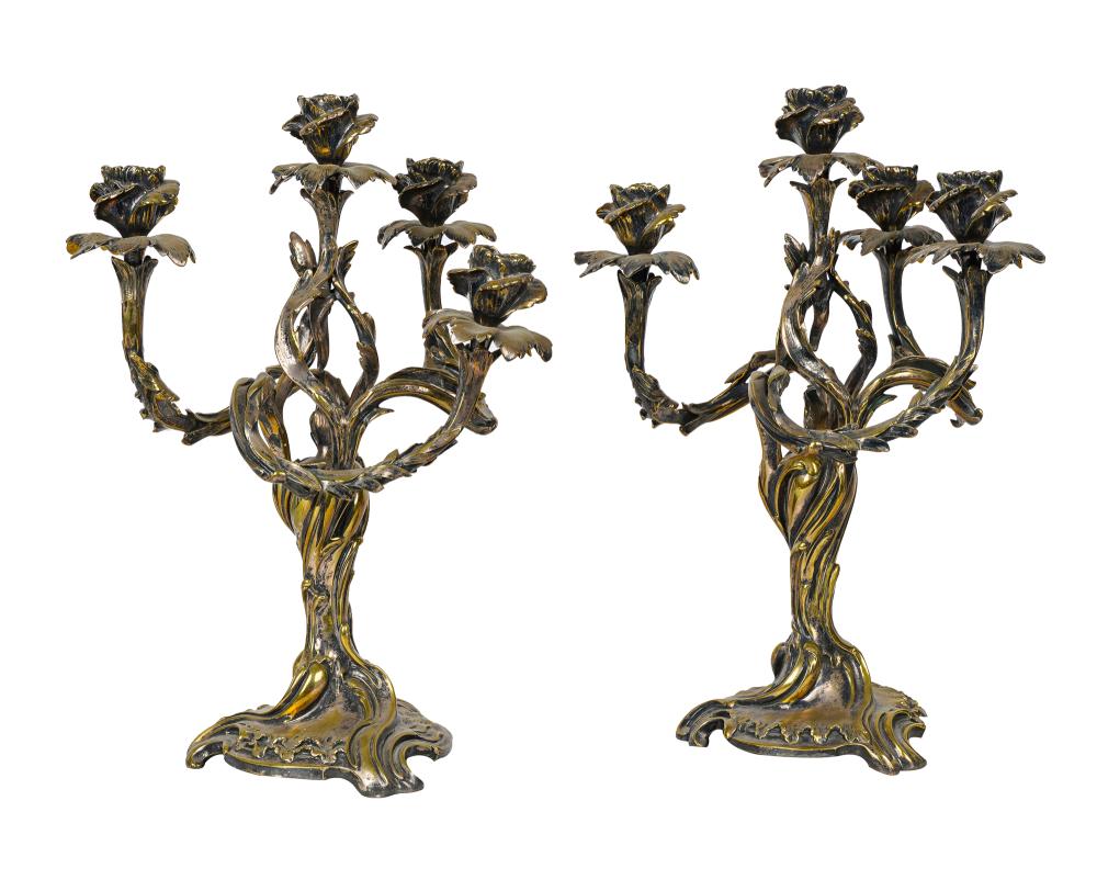 Appraisal: PAIR OF ROCOCO STYLE BRONZE FIVE LIGHT CANDELABRACondition with various